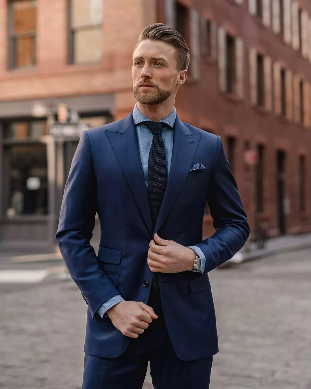 navy suit and blue shirt color combination