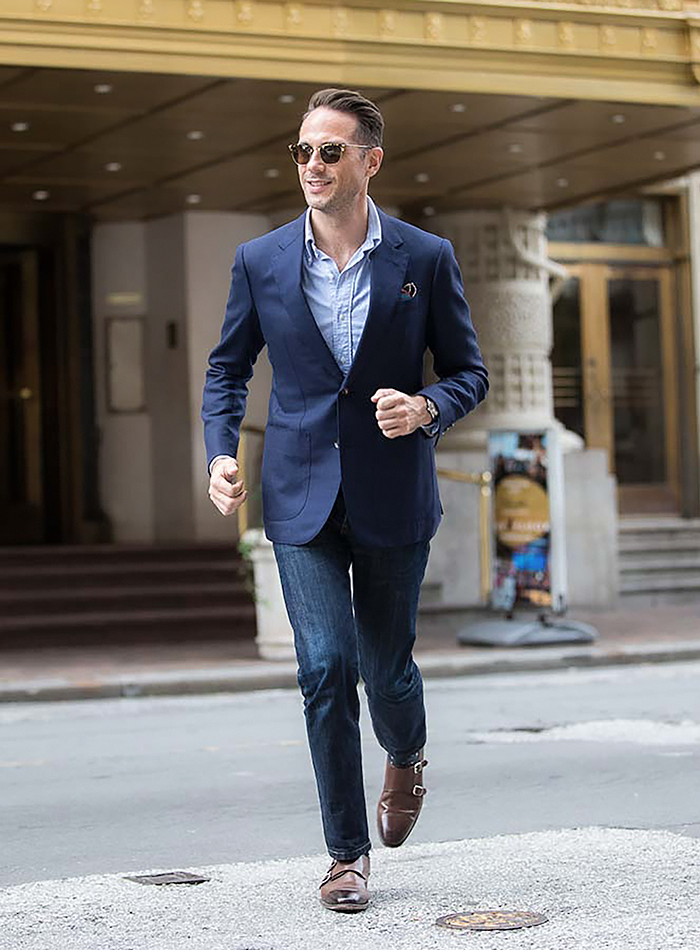 Navy suit jacket, blue shirt, and blue jeans