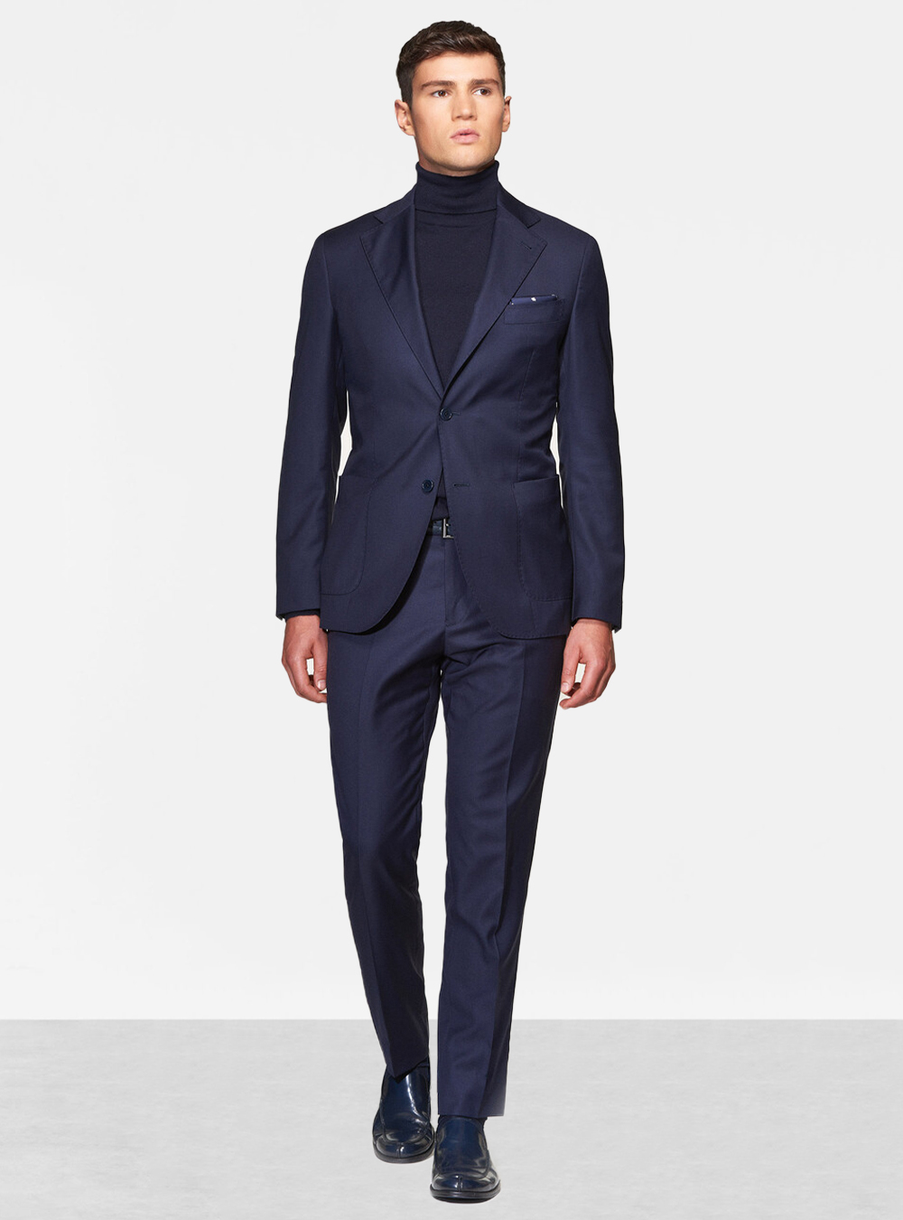 navy suit with a turtleneck