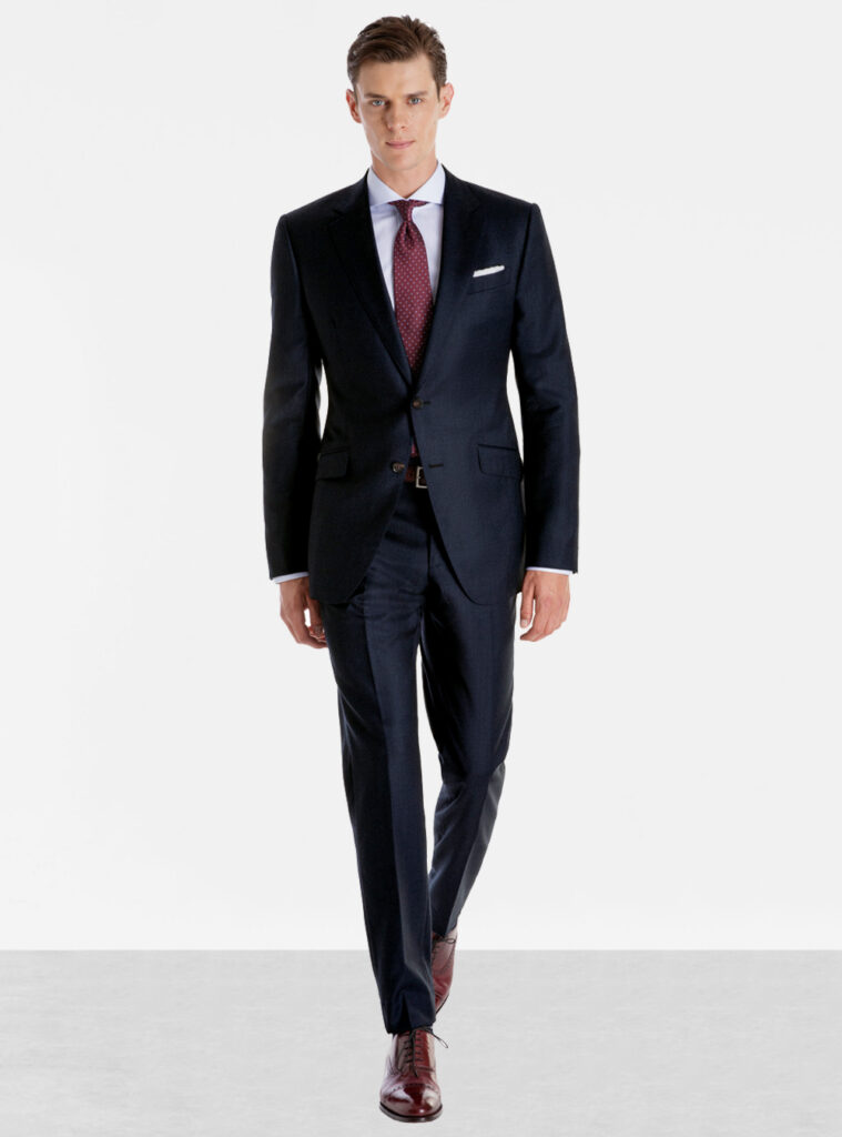 navy suit, white shirt, burgundy dotted tie, and burgundy oxford shoes