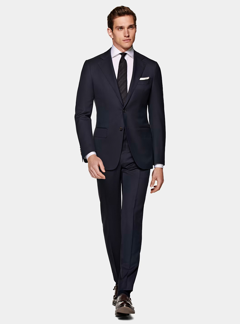 navy suit, white dress shirt, and brown plain toe monk straps