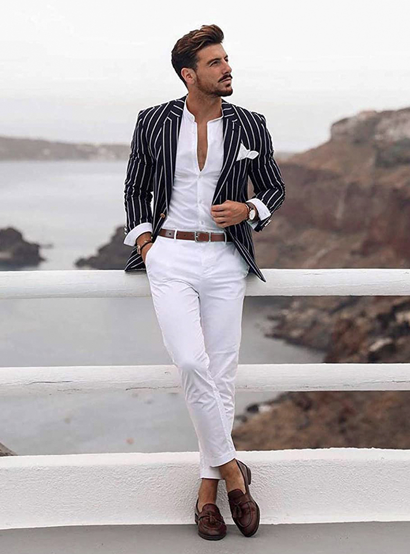 striped black jacket, white shirt and pants, and brown loafers