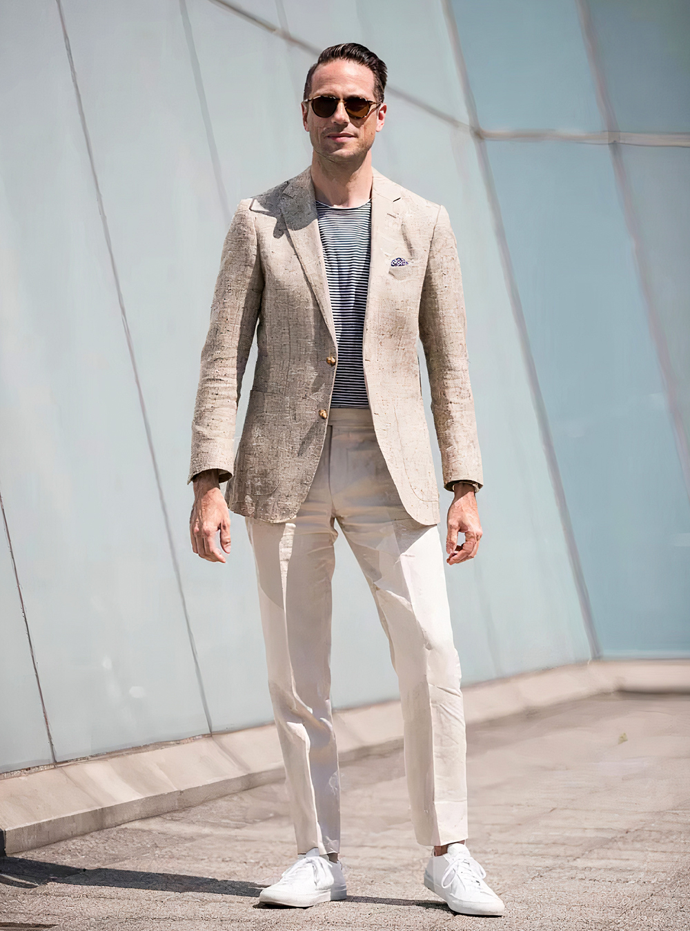 tan blazer, striped T-shirt, beige pants, and white sneakers