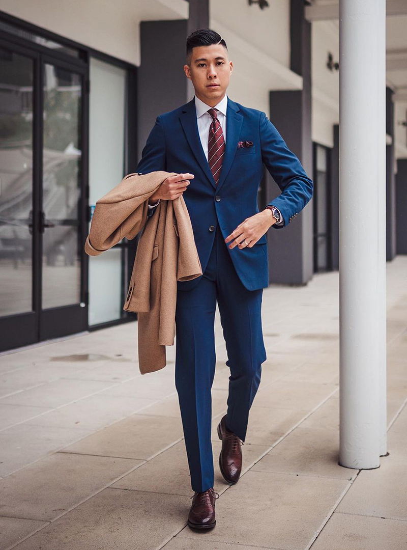 navy suit. white shirt, and dark brown brogues