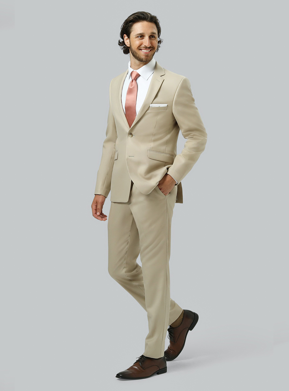 Tan suit, white dress shirt, pink tie and dark brown derby shoes