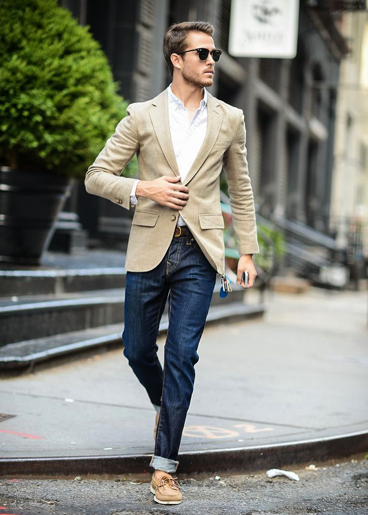 casual tan suit jacket, white shirt, and blue jeans