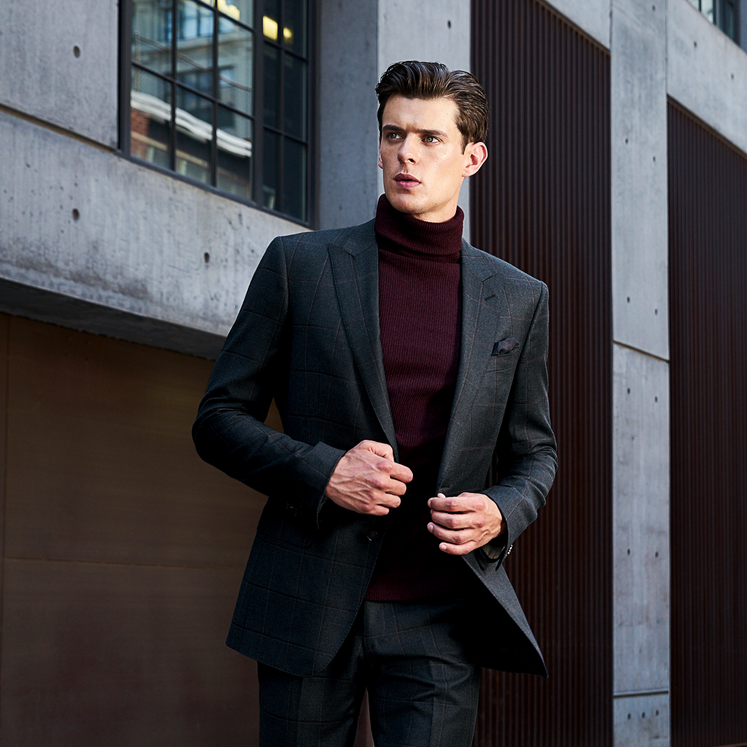 charcoal grey suit and maroon turtleneck