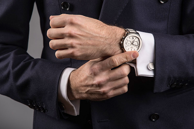 Wearing a chronograph watch with a suit