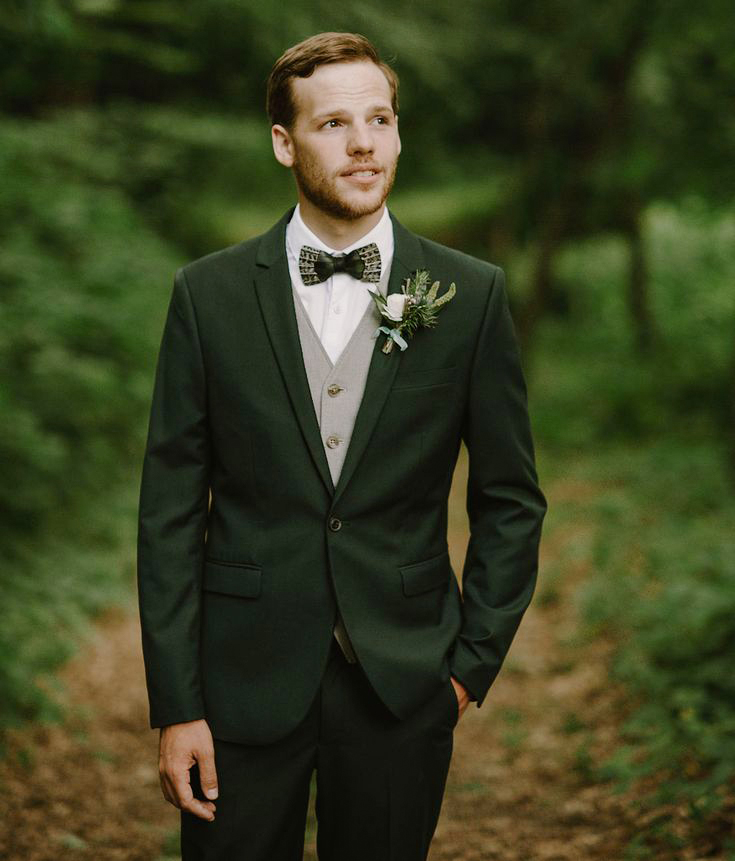 dark green suit on winter wedding