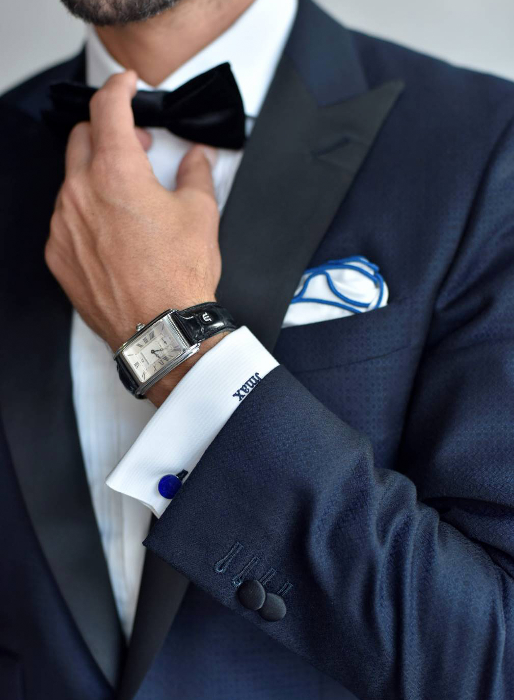 wearing dress watch with midnight blue tuxedo