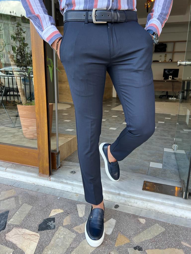 wearing navy flat-front pants more casually