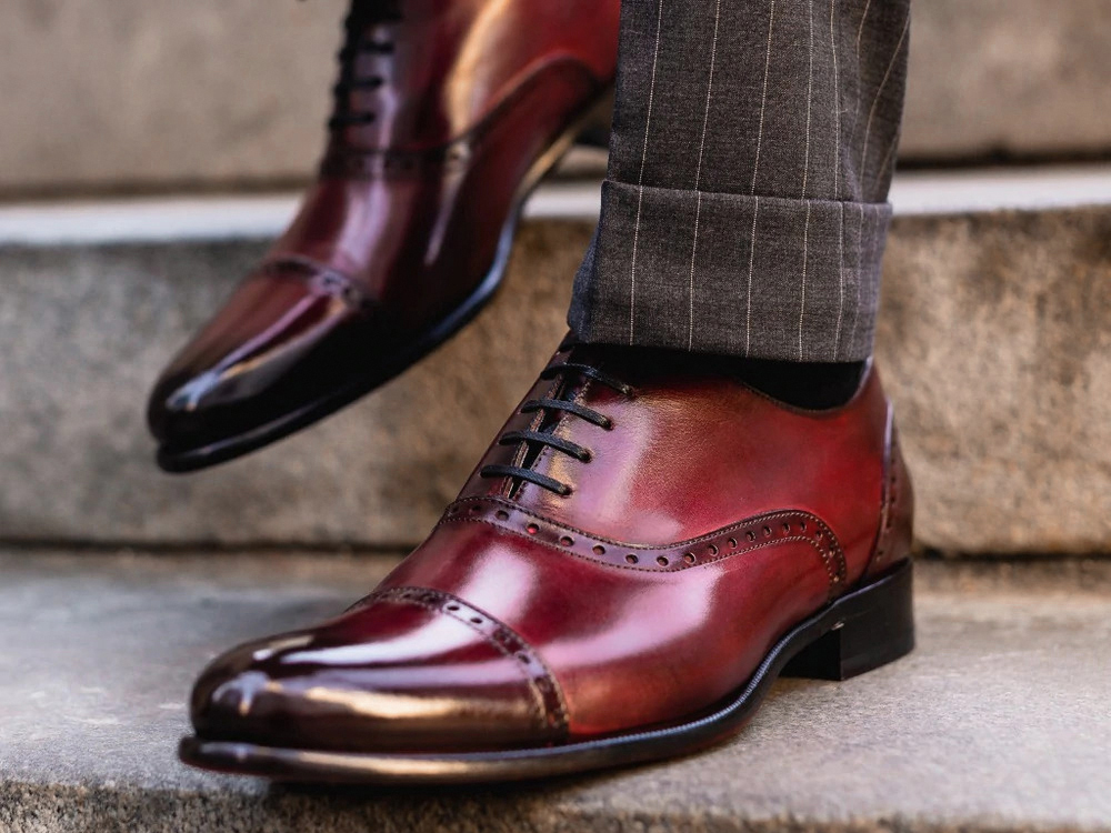 wearing oxblood burgundy dress shoes with brown pants