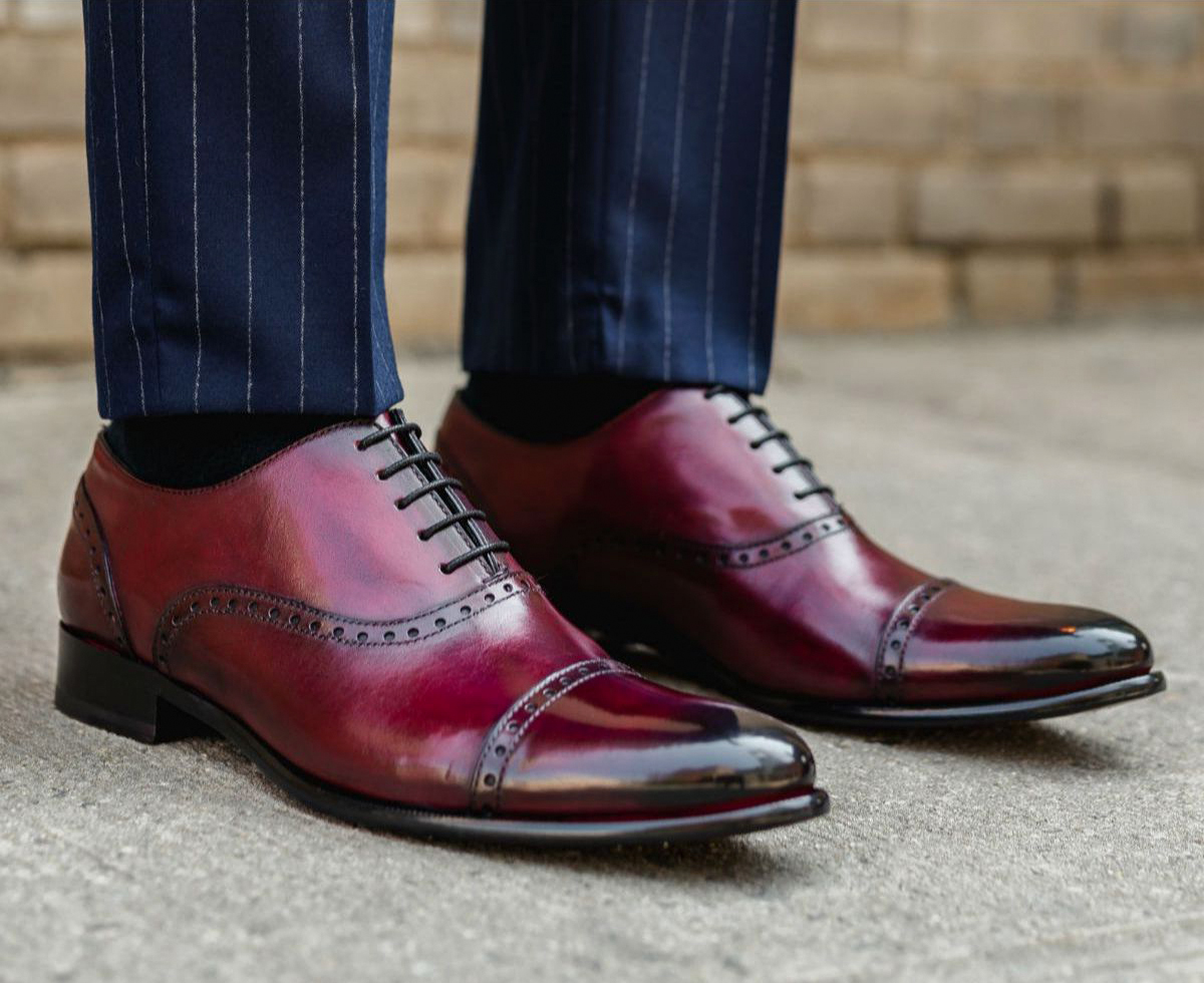 wearing oxblood burgundy dress shoes with navy pants