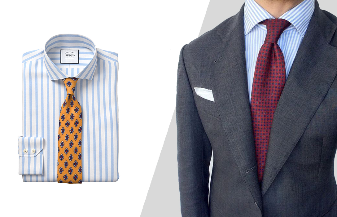 wearing blue striped shirt and burgundy dotted tie with grey suit