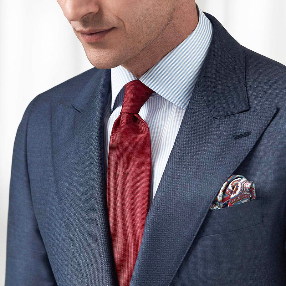 wearing a strong red tie portrays authority, passion, and power