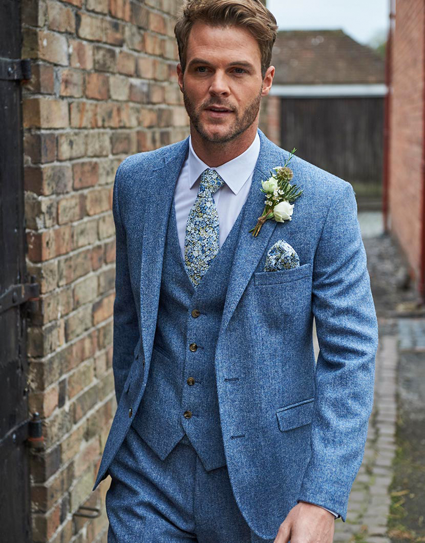 wearing a tweed suit on a wedding