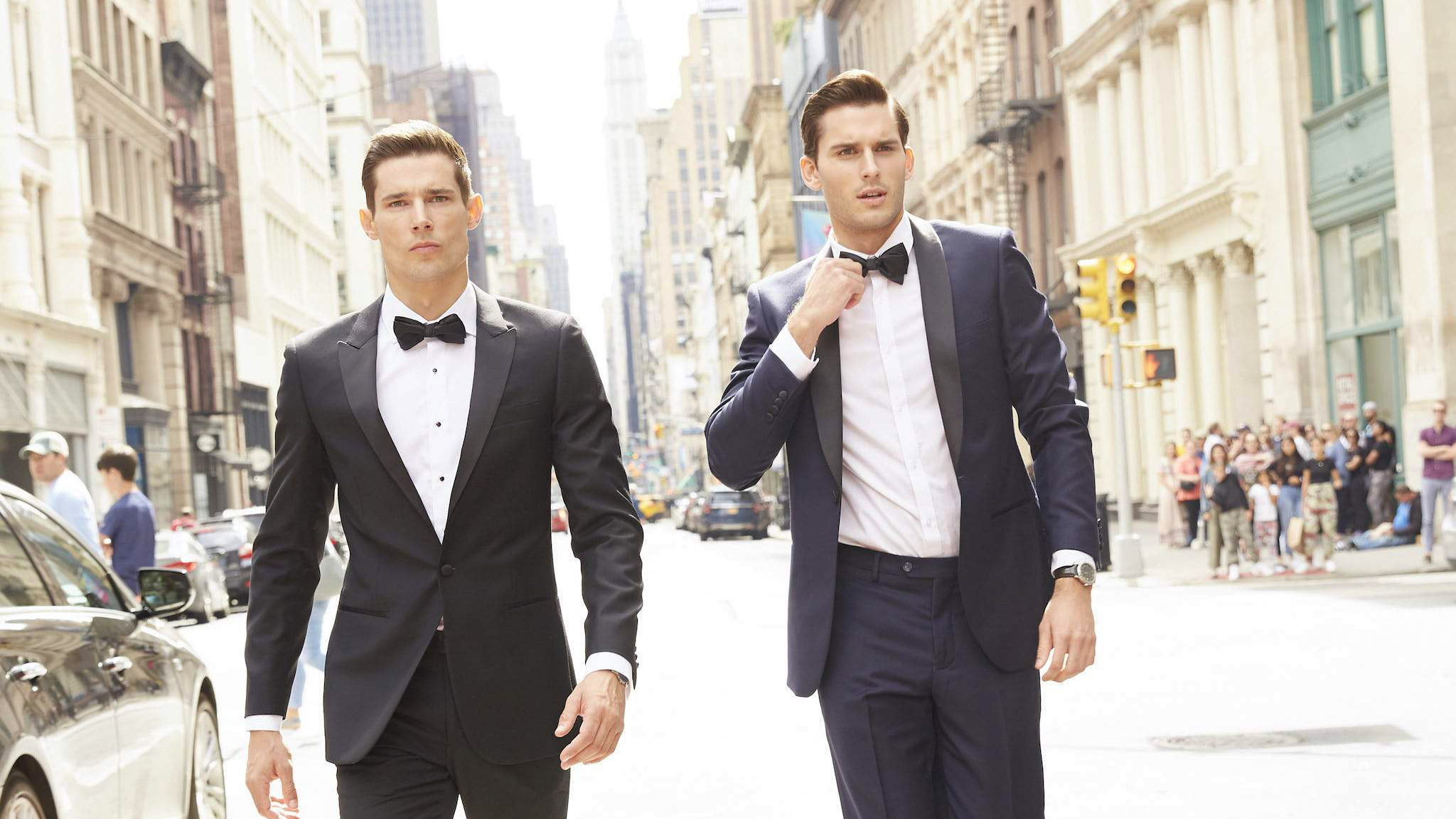 formal summer wedding attire: black tuxedo vs. blue tuxedo