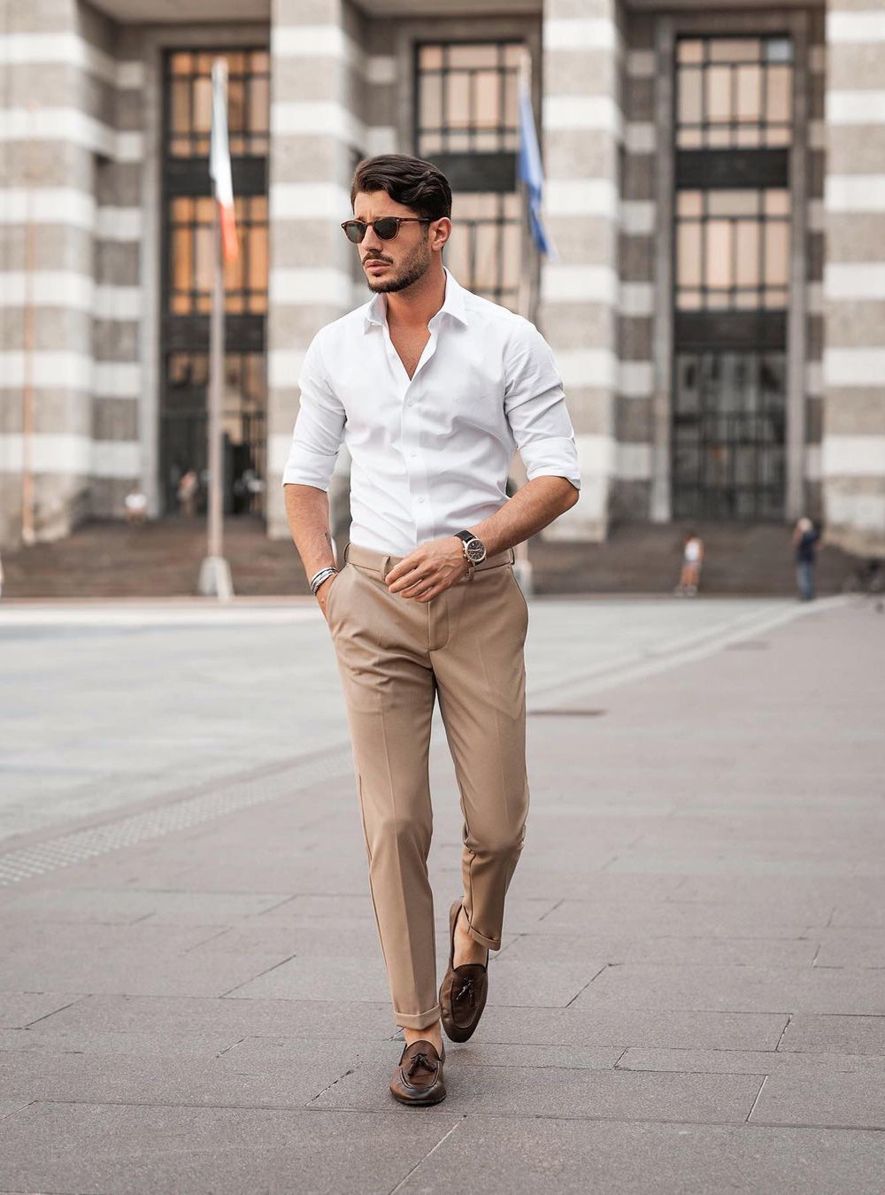 white dress shirt, khaki chinos, and brown loafers with white no-show socks