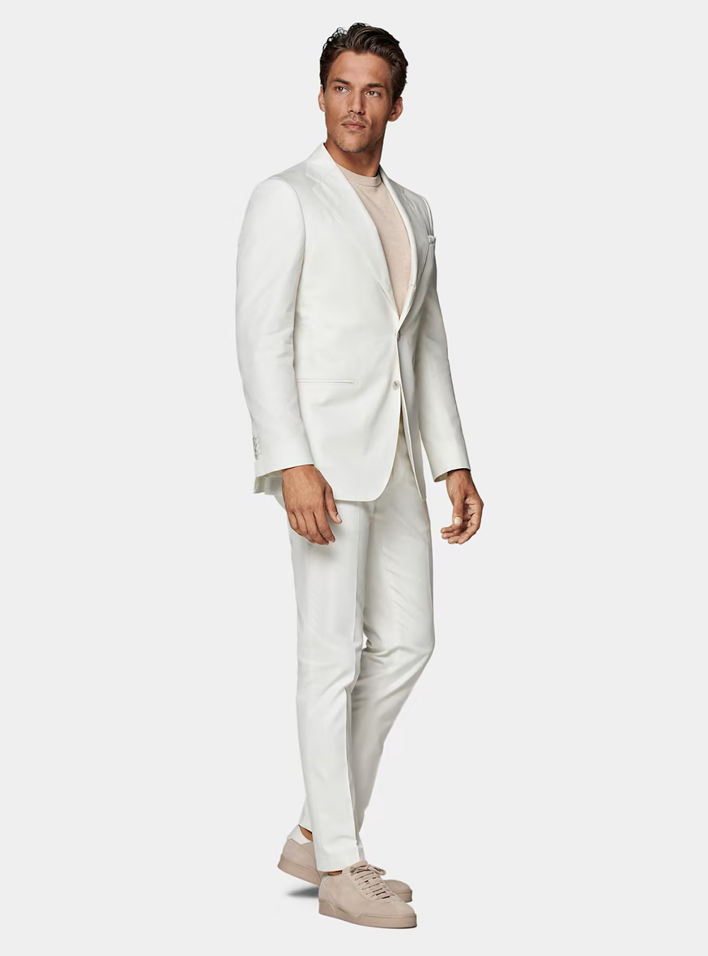 white linen suit, tan t-shirt, and tan sneakers